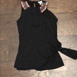 Cache Tops - Black top with orange and silver embellishments Cache Tops - Black top with orange and silver embellishments